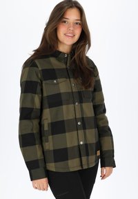 Groen en zwart geruite button-up jas met twee borstzakken en zilveren knopen. Kenmerkt zich door een rechte snit en een zachte katoenen textuur.