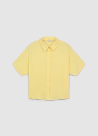 Blouse jaune à manches courtes, tissu léger, boutonnée sur le devant, col, ourlet droit, coupe légèrement oversize, sans motifs ni accents.