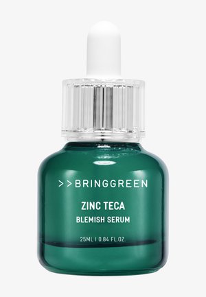 Flacon compte-gouttes en verre vert étiqueté Bringgreen Zinc Teca Blemish Serum d'une capacité de 25 ml avec un bouchon compte-gouttes blanc.