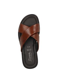 Bruine leren slidesandalen met kruisbanden; zwarte gevoerde binnenzool; maatlabel '42' en merkembleem op de binnenzool.