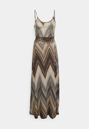 Robe maxi avec des bretelles spaghetti, une taille ajustée et un motif en zigzag dans des nuances de marron, beige et crème. Tissu léger.