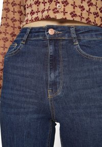 Gina Tricot MOLLY SLIT JEANS - Calças de ganga de corte skinny - rinse