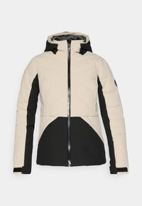 Casaco acolchoado em creme e preto. Apresenta um fecho zip, capuz e um padrão de costura diagonal. Feito de um tecido leve e texturizado.