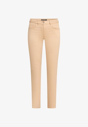 Beżowe obcisłe jeansy wykonane z elastycznej bawełnianej mieszanki. Posiadają pięć kieszeni, suwak oraz subtelnie postarzany wygląd.