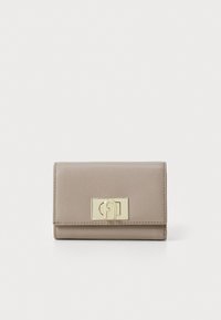 Compact beige leather wallet with a textured finish, featuring a gold metal clasp and a sleek fold-over design.