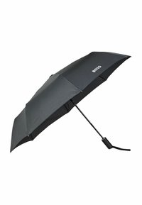 Parapluie noir compact avec une toile en tissu élégant et un cadre en métal léger. Doté d'une poignée en caoutchouc et du logo « BOSS ». 