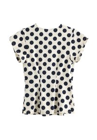 Kortærmet cremefarvet top med marineblå polkaprikker, rund halsudskæring og en udflaret kant. Bomuldsstof med en glat struktur og casual design.