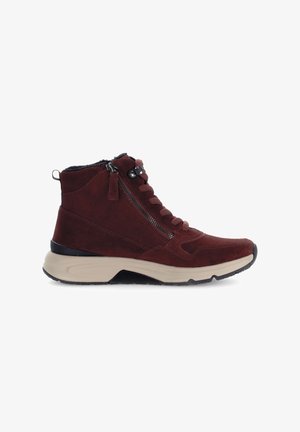 High-top burgundy suede sneaker with a textured finish, contrasting beige sole, side zipper, and traditional lace-up closure.