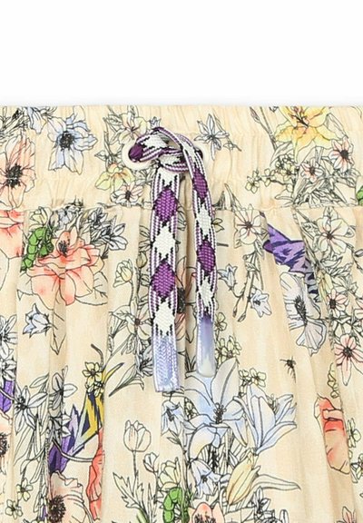 Jupe fleurie avec un fond beige clair, ornée d'une variété de fleurs colorées. Comprend un cordon de serrage avec des motifs d'accent en violet et blanc.