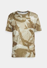 Nike-paita lyhyillä hihoilla ruskea-beige abstrakti kamouflagekuviointi, kevyt kangas, pyöreä pääntie ja huomaamaton logotuki.