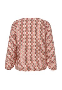 Blouse à manches longues avec poignets élastiques, présentant un motif géométrique de feuilles rouges et blanches sur fond blanc, vue de dos.