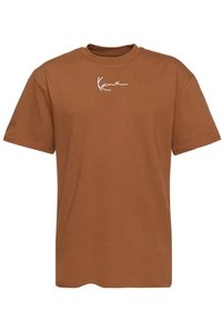 Brown cotton t-shirt with a crew neckline and short sleeves. Features white signature logo on the chest. Smooth texture, casual fit.