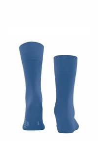 Blaue Knöchelsocken aus dehnbarem Material mit einem gerippten oberen Rand. Enthält Größenmarkierungen an der Unterseite.