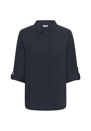 Camisa azul oscuro de botones, hecha de una tela suave. Presenta un cuello clásico, mangas enrolladas y un dobladillo recto.