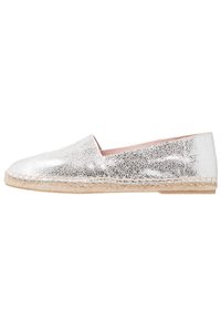 Silver espadrille flat with a textured upper, stitched jute sole, and a rounded toe. The inside features a soft pink lining.