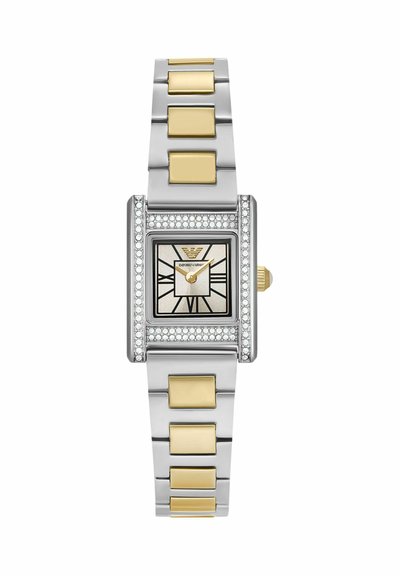 Rectangular silver and gold wristwatch with diamond accents, Roman numeral dial, gold-toned hands, and metal link bracelet.