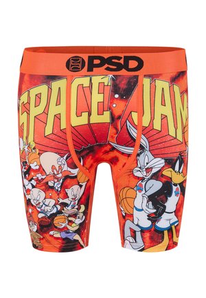 Lyse orange boksertrusser med stor gul "SPACE JAM" tekst og tegneseriefigurerne Bugs Bunny, Daffy Duck og andre, som spiller basketball.