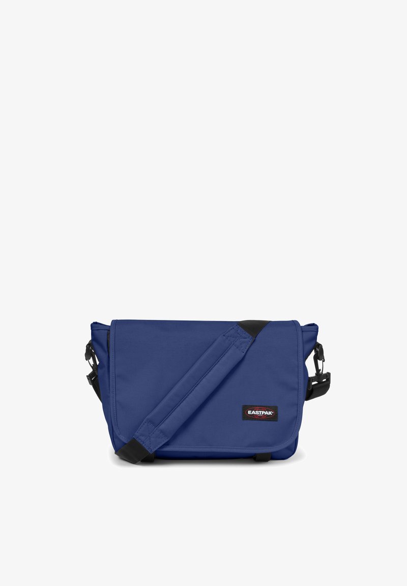 Borsa messaggera blu navy realizzata in tessuto resistente, con tracolla regolabile, chiusura a pattina e una toppa con logo sul davanti.