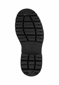 Black rubber shoe sole with a textured, ridged pattern. Features brand logo and size imprint. Rounded toe design.