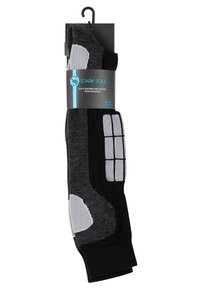 Chaussettes de ski et de snowboard noires et grises avec un talon rembourré gris, des accents aux orteils et un motif antidérapant. Emballées avec un crochet pour l'affichage. Taille 39-42.
