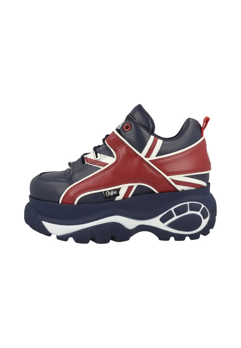 Chunky sneakers featuring a navy blue and red synthetic upper, white accents, textured outsole, and a Union Jack pattern on the side.