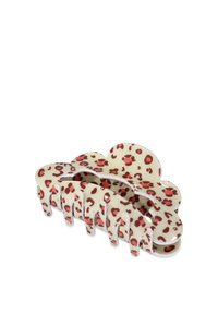 Clips per capelli di plastica color crema con stampa leopardata rossa. Design arrotondato con cinque artigli. Texture liscia e finitura lucida.
