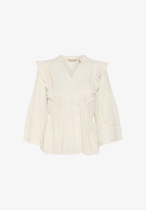 Weiße Bluse mit Rüschen an den Schultern, V-Ausschnitt, strukturiertem Stoff und Spitzenverzierungen entlang der Ärmel und Seiten. Klare und leichte Gestaltung.