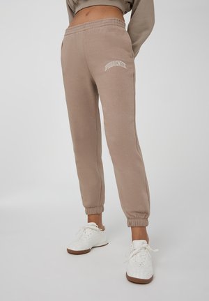 Pantaloni sportivi - fango