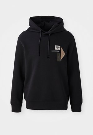 Haut à capuche noir en mélange de coton, avec une poche kangourou et un cordon de serrage. Les détails notables incluent des écussons de la marque à l'avant.