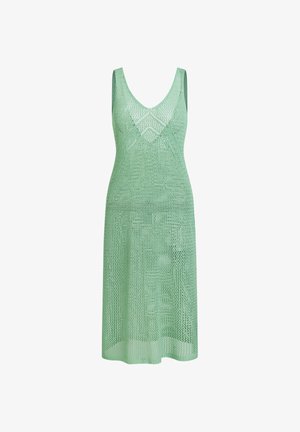 Robe en maille vert clair sans manches avec un col en V, présentant un motif à mailles ouvertes et une silhouette ajustée.