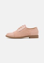 derbies rose gold