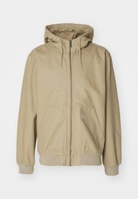 Atlasīts, desert sand