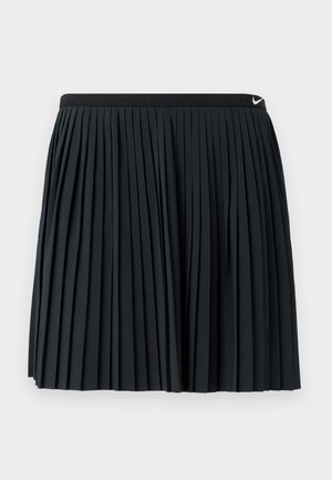 Black pleated skirt with a wide elastic waistband, made of smooth fabric, featuring vertical pleats and a small Nike logo at the waistband.