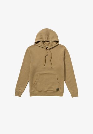 Tan hoodie with a front pocket, drawstring hood, ribbed cuffs, and hem. Smooth texture with a logo patch at the bottom left.