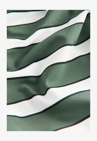 Unselected, green cream stripe