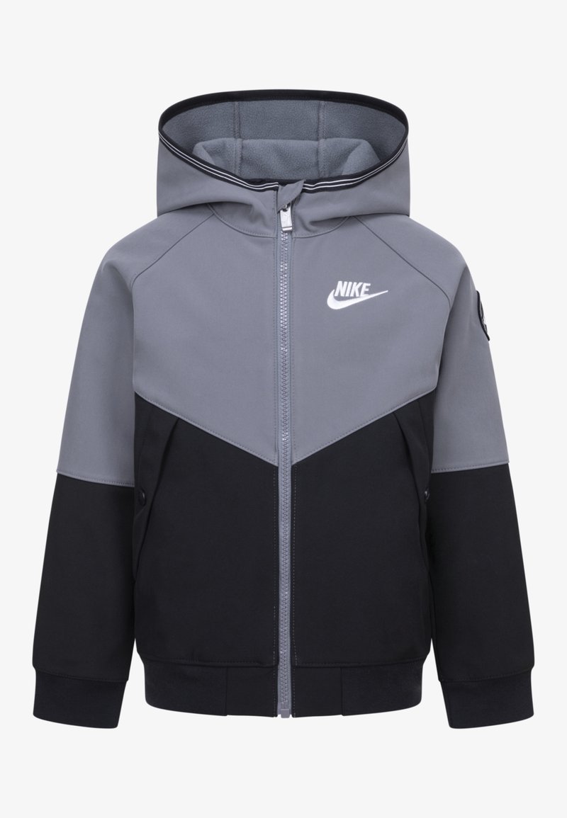Veste à capuche Nike pour enfants en gris et noir avec fermeture éclair à l'avant et logo sur la poitrine, conçue pour la chaleur et un usage décontracté.