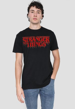 STRANGER THINGS RETRO DRIPPY LOGO - Print T-shirt - black
