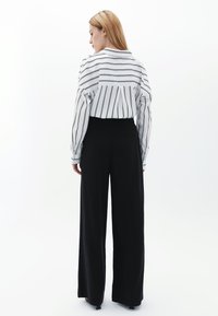 OXXO ULTRA HIGH RISE WIDE LEG  - Broek - black