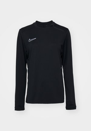 Long-sleeve black athletic top with a round neckline and white Nike logo on the left chest. Smooth texture and fitted design.