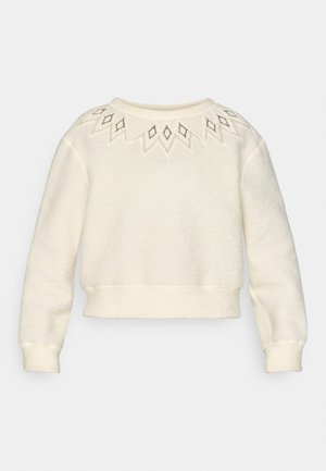 Sweatshirt de cor creme com decote redondo, mangas longas e intrincados padrões de diamante bordados na parte superior.