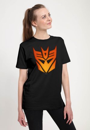 TRANSFORMERS DECEPTICON GLOW ICON - T-shirt con stampa - black