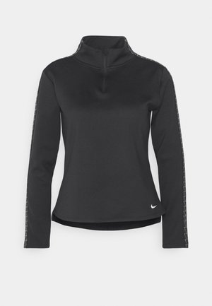 Zwart sporttop met een hoge kraag, lange mouwen en een halve rits. Heeft textuurdetails aan de zijkanten en een klein logo op de onderkant van de voorkant.