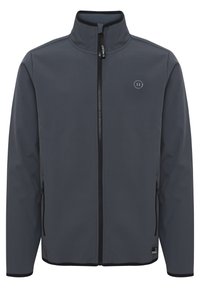 Grey softshell jacket with a high collar, front zipper, and side pockets. Features a small logo on the chest and contrasting black accents.