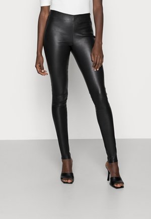 DELTA - Leggings - Trousers - black