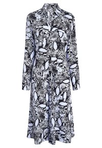 Schwarz-weißer Langarmkleid mit kragenförmigem Ausschnitt, ausgestattet mit einem abstrakten Muster und einer Knopfleiste vorne. Glatte Stofftextur.