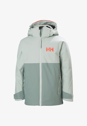 Chaqueta de color verde claro con una sección inferior en verde más oscuro. Presenta un cuello alto, cierre con cremallera en la parte delantera, dos bolsillos laterales y un logo naranja.