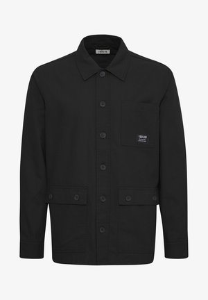 Črn jakna s gumbi in koničastim ovratnikom, z dvema sprednjima žepoma in majhno oznako na prsih. Gladka tekstura blaga s klasičnim dizajnom.