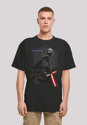 Svart bomull t-skjorte med et grafikk av en karakter med et rødt lyssverd, merket "Star Wars: The Rise of Skywalker."