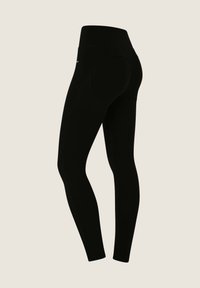 Leggings neri a vita alta realizzati in tessuto elasticizzato, con un design senza cuciture e una silhouette aderente. Nessun hardware o accento visibile.