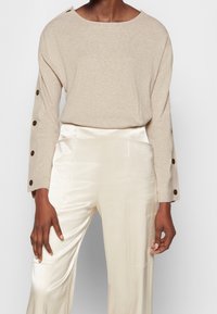 By Malene Birger Svetr - sand